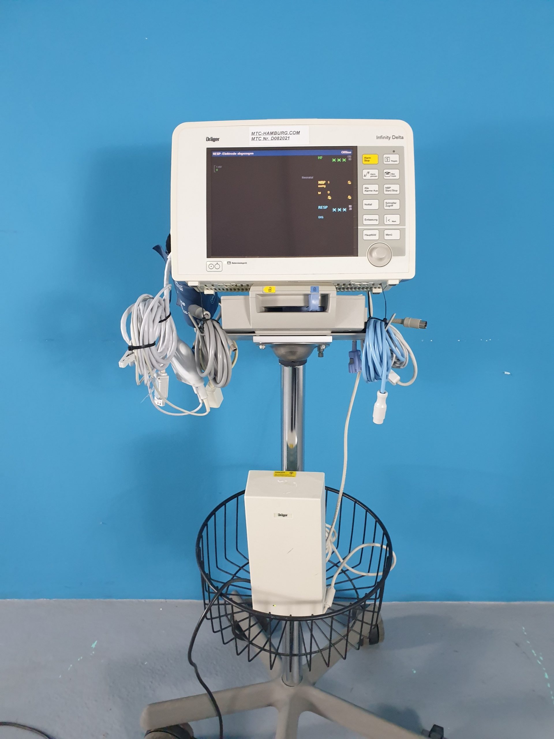 Dräger , Draeger Patientenmonitor Infinity Delta mit Dockingstation, Netzteil und Zubehör auf Farbarem Gestell — image 1 of 7